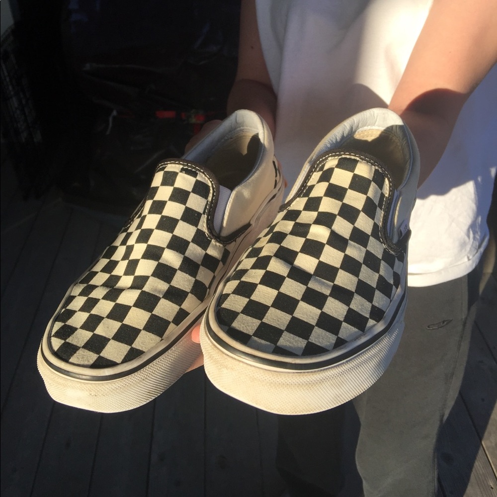 Black and white checkered slip on vans